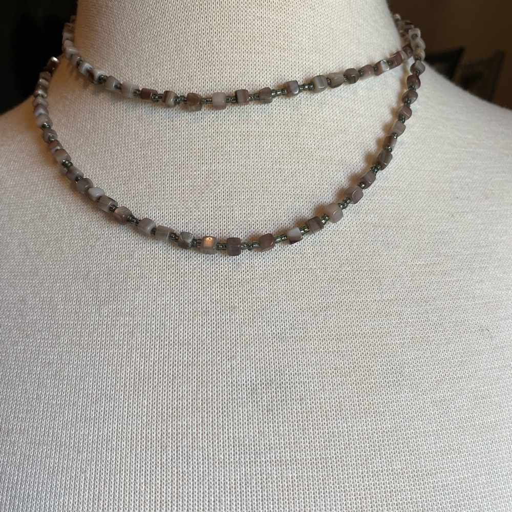 Beautiful necklace worn many ways